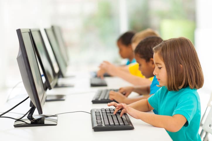 elementary school students in computer class